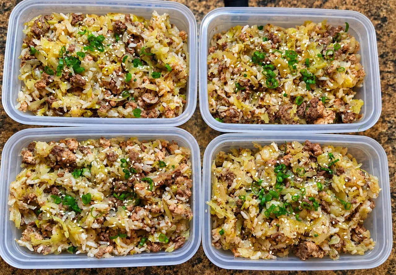 Ground beef, cabbage and rice with green onion and sesame